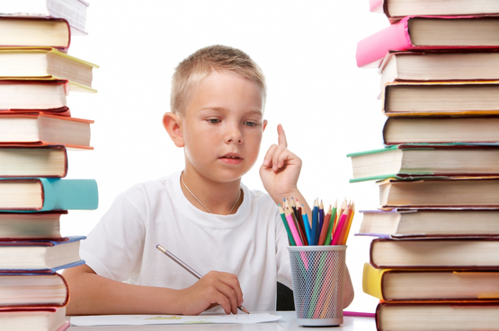 Child thinking and writing picture