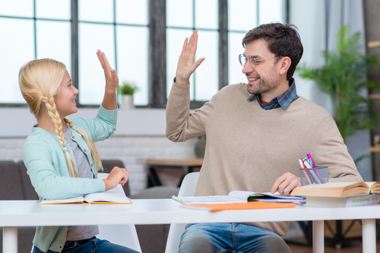 teacher student high five